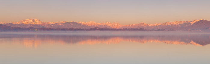 Lombardy, Italy Panoramic of sunrise on Rosa Mount and Alps reflected in Varese lake, Varese province, Lombardy, Italy, Europe Photo by Alessio Giovacchini