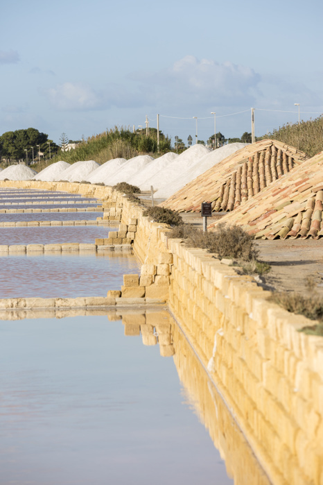Sicily, Italy pyramids of salt drying along the salt pans of Marsala, Trapani province,Sicily,Italy Photo by Giacomo Augugliaro