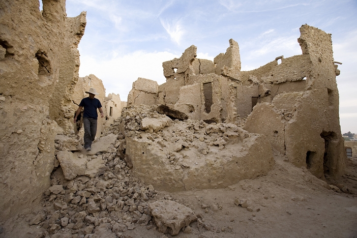 Man exploring, Fortress of Shali, Siwa, Egypt
