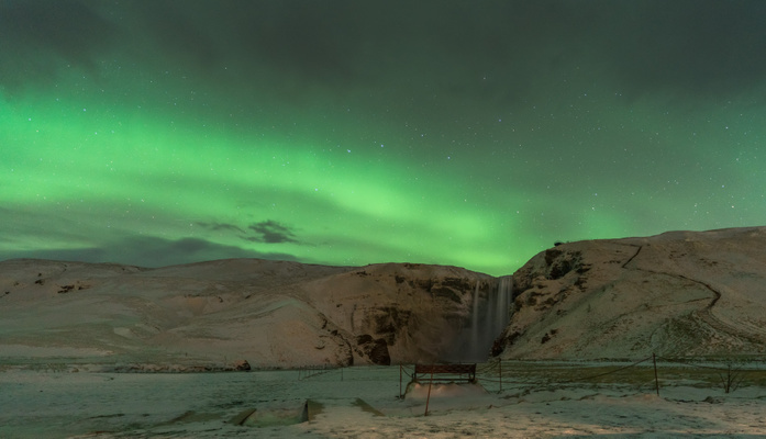 Iceland Northern lights over Skogafoss waterfall, Southern Iceland, Iceland Photo by Maurizio Casula