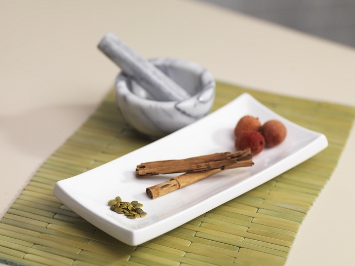 Fruit, Seeds and Spices with Mortar and Pestle