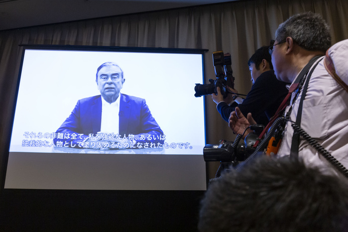 Defense Lawyer Junichiro Hironaka presents Carlos Ghosn s video statement at FCCJ April 09, 2019, Tokyo, Japan   Photographers take pictures of Carlos Ghosn s video statement during a news conference at The Foreign Correspondents  Club of Japan in Tokyo. Defense Lawyer Junichiro Hironaka presented a video statement made by the former chairman and CEO of Nissan Motor Co., Carlos Ghosn when was out on bail. In the video, Ghosn claimed his innocence into his speech that was planning to deliver during a news conference next April 11 announced on Twitter  on April 3  a day before he was arrest for fourth time over new accusations of financial misconduct.  Photo by Rodrigo Reyes Marin AFLO 