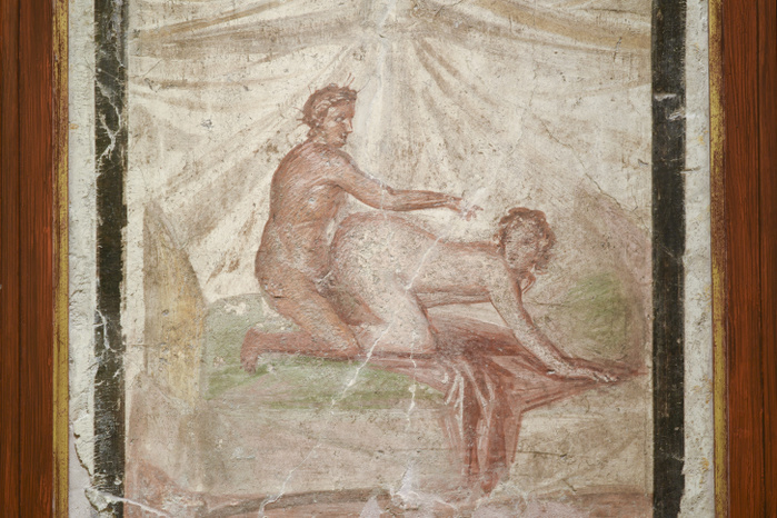 Erotic artwork from Pompeii Erotic artwork from Pompeii, depicting a couple engaged in sexual intercourse. Pompeii on the shores of the Bay of Naples, Italy, was a Roman town destroyed by the eruption of the volcano Mount Vesuvius in 79 AD. The eruption buried the town under a thick layer of ash, and it remained undiscovered until 1599. It was not until 1749 that attempts were made to excavate the town which has been very well preserved in the ash. The excavations revealed a huge amount about daily life at the time. The entire site is now a UNESCO World Heritage Site. Photographed in 2017, in the Secret Cabinet, at the National Archaeological Museum of Naples. Photo by MARCO ANSALONI   SCIENCE PHOTO LIBRARY