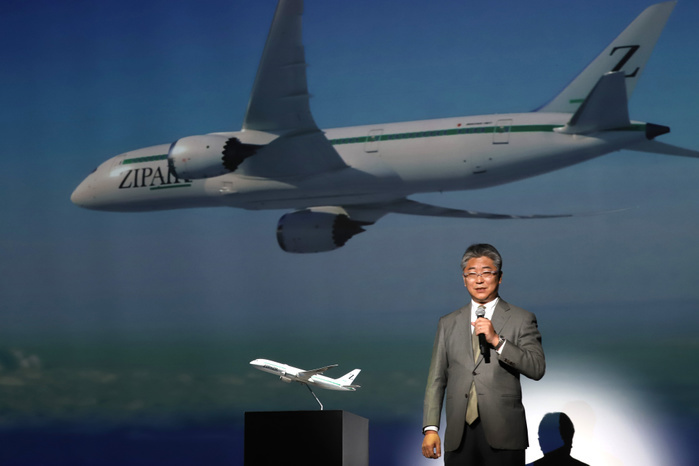 JAL s LCC ZIPAIR displays designs of aircraft and uniforms April 11, 2019, Tokyo, Japan   Shingo Nishida, president of Japan s low cost carrier ZIPAIR displays a model plane of Boeing 787 at a presentation of aircraft design and uniforms of the airline in Tokyo on Thursday, April 11, 2019. Japan Airlines   JAL  wholly owned international budget airline ZIPAIR is expecting to start comercial service in 2020.      Photo by Yoshio Tsunoda AFLO 