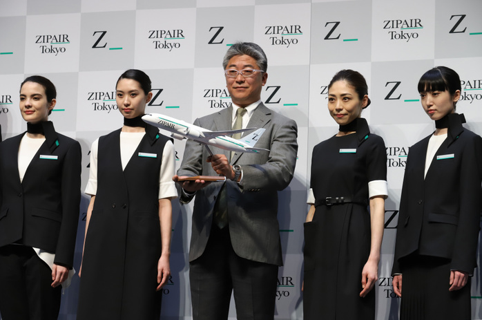 JAL s LCC ZIPAIR displays designs of aircraft and uniforms April 11, 2019, Tokyo, Japan   Shingo Nishida  C , president of Japan s low cost carrier ZIPAIR, accompanied by models in uniforms of ZIPAIR displays a model plane of Boeing 787 at a presentation of aircraft design and uniforms of the airline in Tokyo on Thursday, April 11, 2019. Japan Airlines   JAL  wholly owned international budget airline ZIPAIR is expecting to start comercial service in 2020.      Photo by Yoshio Tsunoda AFLO 