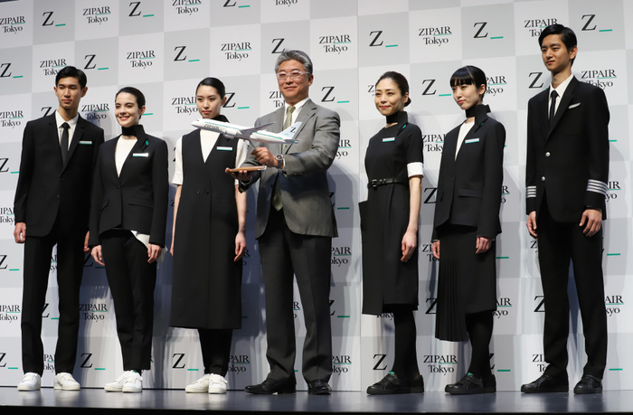 JAL s LCC ZIPAIR displays designs of aircraft and uniforms April 11, 2019, Tokyo, Japan   Shingo Nishida  C , president of Japan s low cost carrier ZIPAIR, accompanied by models in uniforms of ZIPAIR displays a model plane of Boeing 787 at a presentation of aircraft design and uniforms of the airline in Tokyo on Thursday, April 11, 2019. Japan Airlines   JAL  wholly owned international budget airline ZIPAIR is expecting to start comercial service in 2020.      Photo by Yoshio Tsunoda AFLO 
