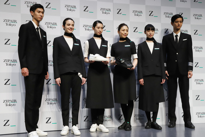 JAL s LCC ZIPAIR displays designs of aircraft and uniforms April 11, 2019, Tokyo, Japan   Models display uniforms of Japan s low cost carrier ZIPAIR at a presentation of aircraft design and uniforms of the airline in Tokyo on Thursday, April 11, 2019. Japan Airlines   JAL  wholly owned international budget airline ZIPAIR is expecting to start comercial service in 2020.      Photo by Yoshio Tsunoda AFLO 