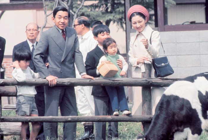 Michiko visits the cows at Kodomo no Kuni. Prince Hiromiya (Crown Prince) holds Princess Norinomiya (Kiyoko Kuroda) in his arms as if he were her older brother. April 1972