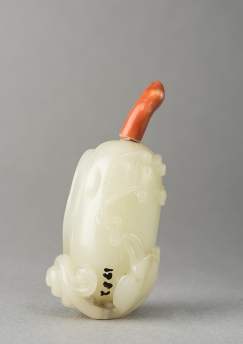 Jade snuff bottle, China, Qing dynasty, 1644 1911. Creator: Unknown. Jade snuff bottle, China, Qing dynasty, 1644 1911. ade snuff bottle in a form to resemble a melon with vines swirling over and around it. Coral stopper in twig form, ivory bone shaft and spoon.
