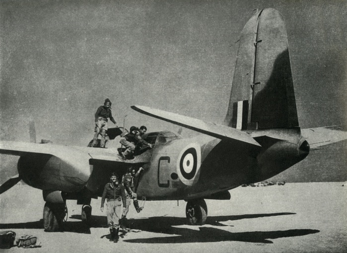  The hot sun streams down on a desert landing ground , c1942 1943,  1945 . Creator: Unknown.  The hot sun streams down on a desert landing ground. A Boston, trim and perky, has returned from a raid  four quick, cheerful South Africans come in to report. The Desert Air Force is in action , c1942 1943,  1945 . From  quot R.A.F. Middle East   The Official Story of Air Operations, Feb. 1942   Jan. 1943 quot .  His Majesty s Stationery Office, London, 1945 