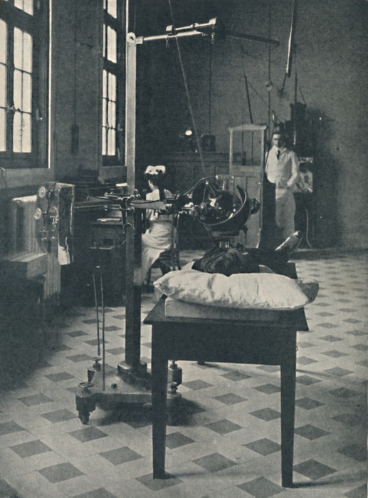 'Crookes, Rontgen and Finsen - Using the Marvellous X-Rays Apparatus', c1925. Niels T. Finsen, (1860-1904). From Cassell's Romance of Famous Lives, Volume 2 by Harold Wheeler. [The Waverley Book Company, Ltd., London, c1925]