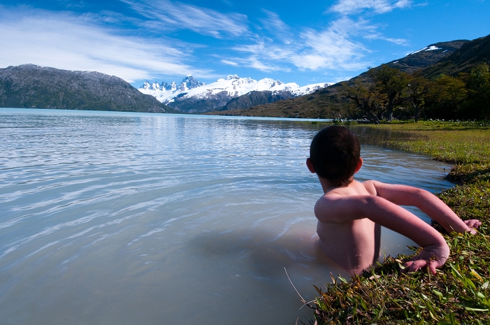 Patagonia, a Treasure Trove of Nature In danger of being submerged by a dam project  A boy playing in the icy glacial waters of Lake O Higgins. This group visited the site of the proposed dams on the Pascua River in Chilean Patagonia. The place Juan is playing would be flooded if the dams proceed.Story on the culture, community activism and landscapes of the region of Chilean Patagonia that will be effected if 5 hydropower dams are created on the Baker and Pascua Rivers  two of the wildest rivers in the world. Completion of the dams would submerge 5,910 hectares of Patagonia s wild lands and would result in the construction of 200 foot tall transmission lines through a clear cut 400 feet wide for 1,500 miles through 64 communities and 14 protected areas. The transmission lines would provide incentive to build more dams between Patagonia and Santiago.  Photo by Bridget Besaw Aurora Photos AFLO   2980 