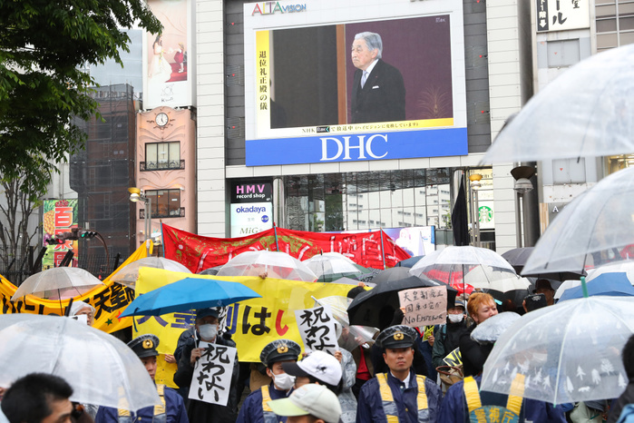 Abdication of Japan s Emperor Akihito People watch a large screen showing Japan s Emperor Akihito attends the abdication ceremony in Tokyo, Japan on April 30, 2019, the final day of Heisei imperial era.  Photo by Yohei Osada AFLO 