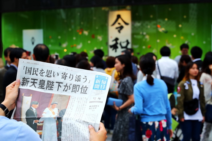 The first day of the Reiwa Era A man holds a copy of extra edition of a newspaper reporting new emperor Naruhito s ascension on the front page in Tokyo s Ginza shopping district, Japan on May 1, 2019, the first day of the Reiwa Era.  Photo by Naoki Nishimura AFLO 