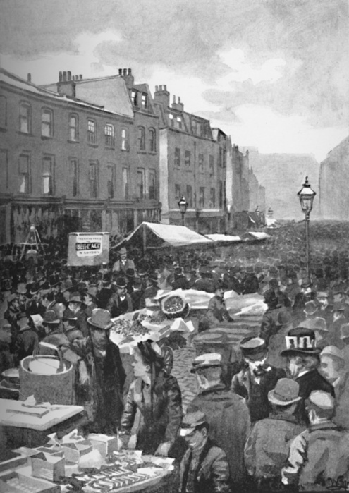 'Middlesex Street (Late Petticoat Lane) on a Sunday Morning', 1891. Petticoat Lane Market, a fashion and clothing market in the East End of London, consists of two adjacent street markets. Wentworth Street Market is open six days a week and Middlesex Street Market is open on Sunday only. From London City: Its History - Streets - Traffic - Buildings - People by W. J. Loftie. [The Leadenhall Prefs, London, 1891]