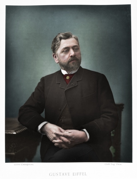 Gustave Eiffel, French engineer, 1880. Eiffel's (1832-1923) most historic and best-known work is the Eiffel Tower, built for the Paris Exposition of 1889, staged to celebrate the centenary of the French Revolution. Built entirely of iron, the Eiffel Tower remained the tallest building in the world until 1930. (Colorised black and white print).