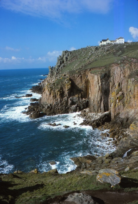 Granite Cliffs below Lands End mine, Cornwall, England, 20th century. Granite Cliffs below Lands End mine, Cornwall, England, 20th century. Land s End is a headland and the most westerly point of mainland Cornwall and England with granite dating to 268 275 million years ago, the Permian period.
