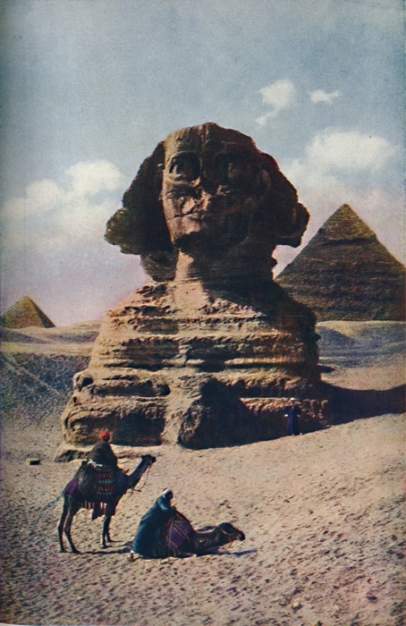 'Cairo. For close upon 5000 years the enigmatic Sphinx of Gizeh, a human-headed couchant lion. Has gazed the Nile Valley', c1920. The Great Sphinx of Giza is a limestone monument located on the west bank of the Nile and dated to the Old Kingdom 4th dynasty, during the reign of the Pharaoh Khafre (c. 2558û2532 BC ).  From Geographical Magazine, Volume 2, c1920.