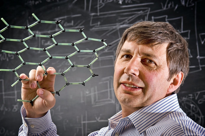 Nobel Prize in Physics Two researchers on new carbon materials  Material photo 2009   Andre Geim  born 1958 , Russian born physicist. Professor Geim, seen here holding a model of graphene, is Director of the Centre for Mesoscience and Nanotechnology at Manchester University, UK. His notable achievements include, the development of a material with similar adhesive properties to the feet of gecko lizards, the first magnetic levitation of a live animal  frog , and the discovery of graphene, a single layer of carbon atoms with many potential technology applications. Photographed in 2009.  Photo by Science Photo Library AFLO 
