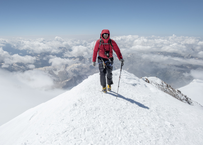 Russia, Upper Baksan Valley, Caucasus, Mountaineer ascending Mount Elbrus Russia, Upper Baksan Valley, Caucasus, Mountaineer ascending Mount Elbrus