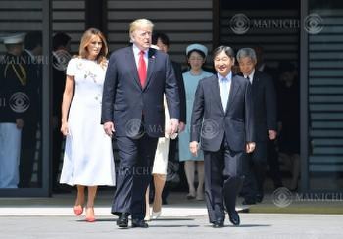 Emperor Akihito at the welcoming ceremony for U.S. President Trump  foreground, left  Emperor Akihito attends a welcoming ceremony for U.S. President Donald Trump  foreground, left  at the East Garden of the Imperial Palace, May 27, 2019.
