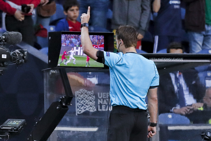 Portugal: Portugal   Switzerland referee Felix Brych checking on field review monitor recommended by Video Assistant Referee  VAR  Christian Dingert during the UEFA Nations League Semi final match between Portugal 3 1 Switzerland at Estadio do Dragao in Porto, Portugal, June 5, 2019.  Photo by Pro Shots AFLO 
