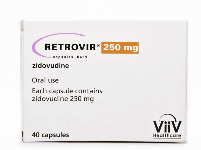 Zidovudine HIV drug Editorial use only   Zidovudine HIV drug. Box containing capsules of the nucleoside analogue reverse transcriptase inhibitor drug zidovudine, marketed under the name Retrovir. This drug is used as a part of antiretroviral therapy in the treatment of HIV  human immunodeficiency virus . It slows the spread of HIV in the body by inhibiting reverse transcriptase, the enzyme that converts HIV RNA  ribonucleic acid  into viral DNA  deoxyribonucleic acid  that can be incorporated into human cells.