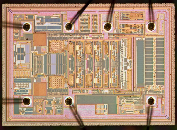 Smartphone MEMS microphone, light micrograph Light micrograph of a MEMS  MicroElectroMechanical System  microphone amplifier wafer. MEMS microphones are installed in nearly all modern smartphones. The image shows the complete amplifier wafer with the connection bond wires, the two wires on the left side connected with the MEMS unit. The amplifier is mounted together with the MEMS wafer in the small housing. Microscopic contrast technique: Incident differential interference contrast. Magnification: 80x when printed 10 centimetres wide.