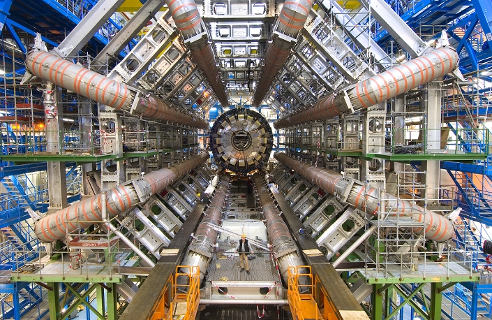 European Organization for Nuclear Research Large Hadron Collider  November 2005  . ATLAS detector, CERN. ATLAS  A Toroidal LHC Apparatus  is one of six detector experiments at the Large Hadron Collider  LHC  particle accelerator at CERN, Geneva, Switzerland. It has eight toroids  grey  that generate the magnetic field needed to confine the particles. ATLAS is a broad range detector that measures all particles and physical processes that emerge during proton collision within the LHC. The LHC is designed to create high energy substances, such as quark gluon plasma, thought to exist very early in the universe s history. Photographed in November 2005. MODEL RELEASED
