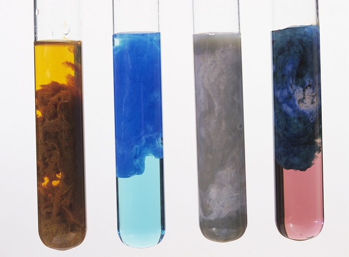 Metal precipitates. Four test tubes showing the colours of metal ion solutions and the formation of the solid precipitates of the metal hydroxides. From left: iron (Fe3+, Fe[OH]3), copper (Cu2+, Cu[OH]2), chromium (Cr3+, Cr[OH]3) and cobalt (Co2+, Co[OH]2). These are all transition metal elements with specific oxidation states that can explain the colours produced. The formation of the solid hydroxide of a metal is often used to test for that metal. Strictly speaking, the hydroxide is not always formed first. Cobalt hydroxide is pink, and the blue precipitate seen here is an intermediate form known as a basic salt.