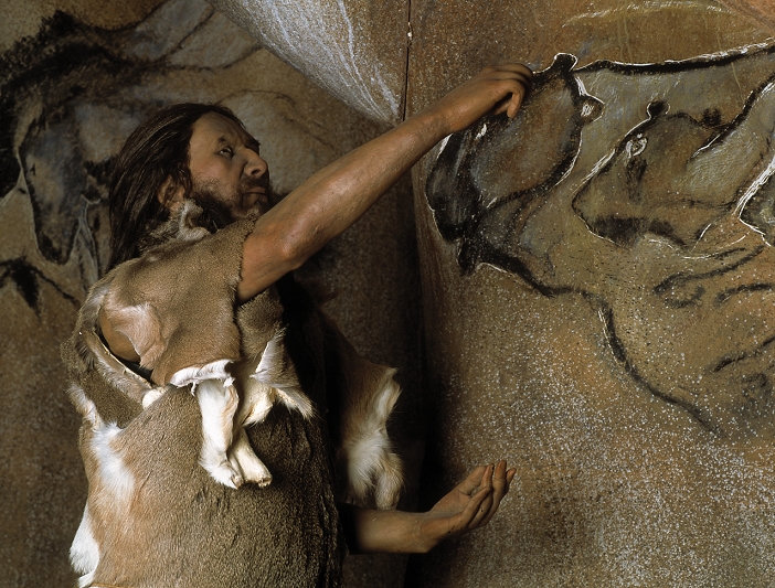 Cave painting. Model of a Cro-Magnon man, a type of early modern human (Homo sapiens sapiens), doing a cave painting. It is thought that animals were painted onto the walls of the caves in which Cro-Magnons lived to give their hunters power over animals, ensuring a successful hunt. Cave paintings first appeared in Europe around 35,000 years ago. Cro-Magnons lived in Europe, northern Africa and southern Asia from 50,000 years ago. Cro-Magnons are so-called due to discoveries made in a rock shelter of that name in France. This model, from a Nordstar exhibition, was photograph- ed at the Naturkundemuseum in Stuttgart, Germany.
