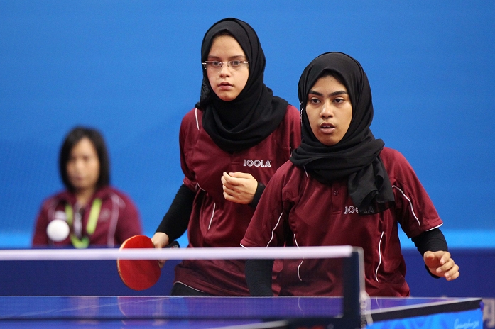 2010 Guangzhou Asian Games Table Tennis Championships Women s Doubles  L to R  Mohamed Aia Magdy, Faramarzi Mahaabdulreda  QAT ,  NOVEMBER 17, 2010   Table Tennis :  2010 Guangzhou Asian Games, Women s Doubles 1 16 Round  at Guangzhou Gymnasium, Guangzhou, China.    Photo by AFLO SPORT   1045 