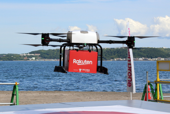 Rakuten and Seiyu have a demonstration of drone delivery service as they will start the service June 17, 2019, Yokosuka, Japan   A drone arrives at Sarushima island off the coast of Yokosuka in Tokyo Bay for a demonstration of a drone delivery service from Yokosuka, some 2km far from Yokosuka on Monday, June 17, 2019. Japanese e commerce giant Rakuten and Walmart s subsidiary Seiyu supermarket chain will launch a drone delive service between Sarushima island and Seiyu s shopping mall in Yokosuka city from July 4 as the remote islnad has no supermarket and convenience store.    Photo by Yoshio Tsunoda AFLO 
