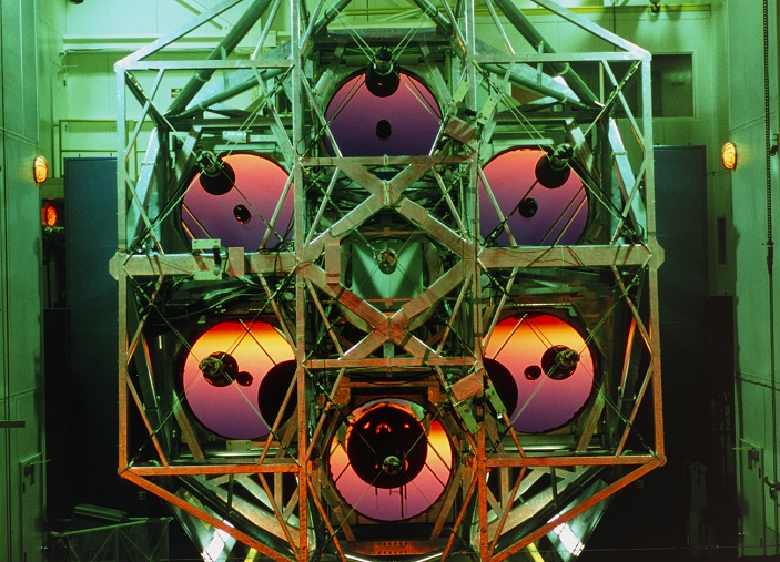 Close-up of the Multiple Mirror Telescope (MMT) on Mount Hopkins, Arizona. It consists of six separ- ate mirrors, each 1.8 metres (72 inches) in diameter. Working together, they effectively form a single mirror 4.5 m (178 inches) in diameter, making the MMT one of the world's largest telescopes. Since starting operation in 1979, the MMT has proven the feasibility of using a number of smaller mirrors to provide an equivalent light- gathering surface to a single giant mirror. The technique is important because it is not technic- ally possible to make single telescope mirrors much larger than 8 m in diameter.