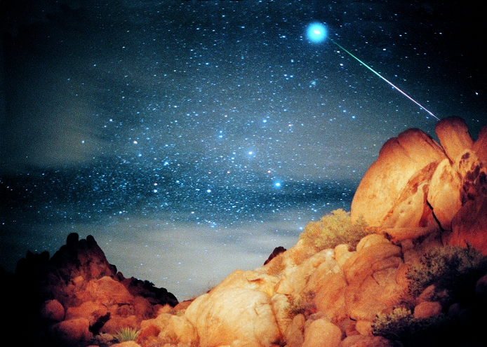 THIS PICTURE MAY NOT BE USED ON  RETAIL MERCHANDISE IN THE U.S.A. Leonid meteor and Sirius. Optical image of a Leonid meteor (bright streak) and Sirius, the Dog Star (bright spot). Meteors, or shooting stars, are tiny particles of dust which enter the Earth's atmosphere with speeds of 35-95 kilometres per second. Air resistance heats the particles, making them visible as streaks of light. The Leonid meteor shower occurs annually around 17th November when the Earth crosses the path of debris produced by the Tempel-Tuttle 1886 I comet. Sirius is the brightest star in the sky and one of the nearest to Earth at a distance of 8.7 light years. It is in the constellation of Canis Major.