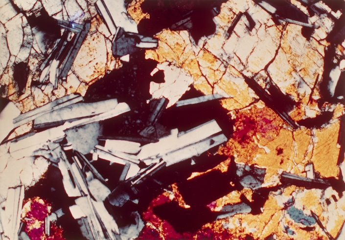Photomicrograph showing a thin section of crystalline igneous rocks, collected by the Apollo 14 lunar landing mission. The latter was the third manned lunar landing & was launched on 31 Jan, 1971.