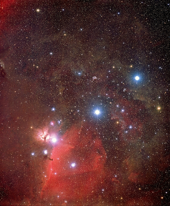 Orion's Belt. Optical image of the three bright stars making up Orion's Belt in the constellation of Orion. North is at top. Forming a straight line from upper right to lower left, the stars are: Mintaka (Delta Orionis), Alnilam (Epsilon Orionis) and Alnitak (Zeta Orionis). There are two bright emission nebulae (red) near Alnitak at lower left. The Flame Nebula (NGC 2024, pink, left of Altinak) is bisected by a dark lane of dust. Below Altinak is the Horsehead Nebula (Barnard 33), a lane of dark dust extending over the emission nebula IC 434 (red). The red glows are due to the ionisation of hydrogen by radiation from nearby stars.