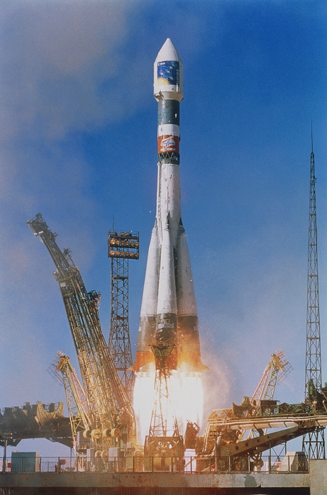 Soyuz-Fregat rocket launch from Baikonur Cosmodrome, Kazakhstan, on 16 July 2000. This was flight ST09 by the French-Russian consortium Starsem. It delivered the first pair of Cluster II satellites into Earth orbit. The satellites are contained in the Fregat upper stage, which sits above three lower stages that successively boost the cargo into orbit. Another pair of Cluster II satellites were launched in August 2000. The four satellites then began a study of the interaction between the solar wind and the Earth's magnetic field.