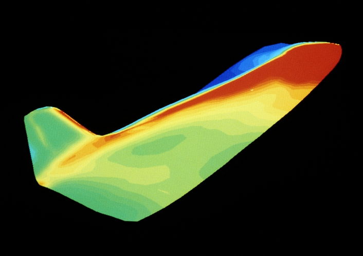 ^BTHIS PHOTO MAY NOT BE USED TO STATE OR IMPLY ^BENDORSEMENT BY DASSAULT OF ANY COMPANY OR PRODUCT. Computer-generated temperature map of Hermes, the European Space Agency's re-usable spaceplane, during upper atmosphere re-entry. The hottest areas, in red, are the nose & wing leading edges with temperatures up to 1800 degrees Centigrade. Thermal models allow designers to find the optimum distribution for heat resistant materials. Hermes will be 15 metre long with an 11 metre wingspan. Its launch weight of 22 tonnes will include 3 crew members & a 3 tonne payload. It will be placed in low earth orbit by an Ariane 5 rocket.