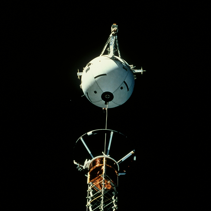 Tethered satellite deployment. View of the second Tethered Satellite System (TSS-2) at the start of its deployment. The supportive boom is seen. TSS-2 was designed to be reeled out to 20 kilometres from Shuttle Columbia in orbit. The purpose was to investigate the possibilities of generating electricity as the conducting tether passed through the Earth's magnetic field. Unfortunately, when reeled out to about 10 kilometres the tether broke and the satellite was lost. This followed a previously aborted mission in 1992 when the tether reeling mechanism jammed. NASA did, however, gather data from the experiment. TSS-2 was carried on Mission STS-75 of 22 February to 9 March 1996.