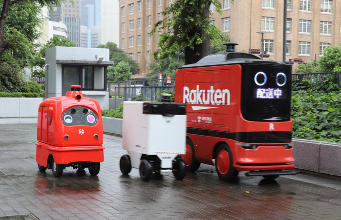 Delivery robots are displayed as public private council is set up to promote last one mile delivery robots June 24, 2019, Tokyo, Japan   Delivery robots  L R  ZMP s CaliRo Deli of Japan, Marble of the United States and Chinese e commerce company DJ.com s delivery robot run for a demonstration at the entrance of the Ministry of Economy, Trade and Industry  METI  in Tokyo on Monday, June 24, 2019. METI and private companies set up a public private council to promote autonomous delivery robots for the last one mile delivery of parcels.    Photo by Yoshio Tsunoda AFLO 