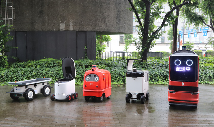 Delivery robots are displayed as public private council is set up to promote last one mile delivery robots June 24, 2019, Tokyo, Japan   Delivery robots  L R  Effidence s EffiBOT of France, Japan s Hakobot, ZMP s CaliRo Deli of Japan, Marble of the United States and Chinese e commerce company DJ.com s delivery robot are displayed at the entrance of the Ministry of Economy, Trade and Industry  METI  in Tokyo on Monday, June 24, 2019. METI and private companies set up a public private council to promote autonomous delivery robots for the last one mile delivery of parcels.    Photo by Yoshio Tsunoda AFLO 