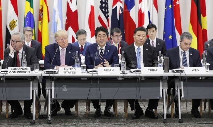 Prime Minister Abe addressing a special G20 Summit Leaders  event on the digital economy. Prime Minister Shinzo Abe  center  addresses a special summit event on the digital economy at the G20 Summit in Osaka, Japan, June 28, 2019, at 0:23 p.m.  Representative Photo 