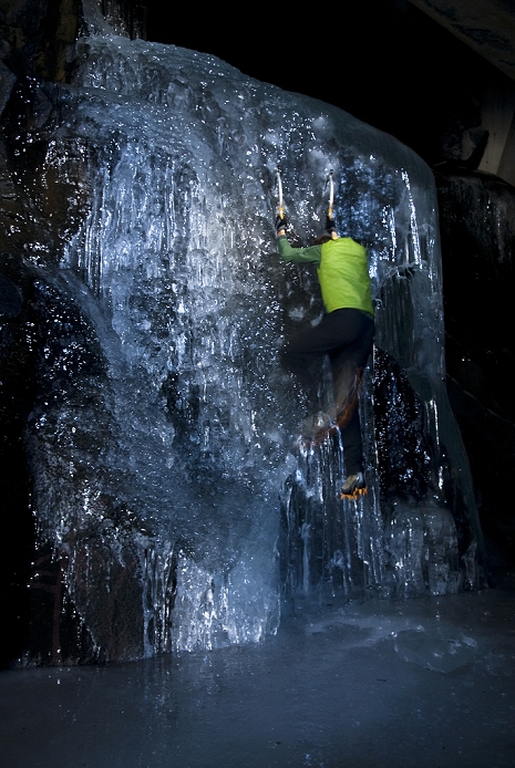 A young man practices some ice climbing techniques in order to further his skills, in Truckee, California.