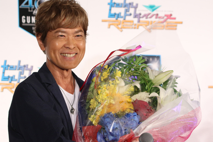 Japanese voice actor Toru Furuya attends a promotional event of the new Gundam animation July 31, 2019, Tokyo, Japan   Japanese voice actor Toru Furuya receives a flower bouquet as he turns the 66 year old at a promotional event of the new Gundam animation series and launching of an official YouTube channel  Gundam Channel  in Tokyo on Wednesday, July 31, 2019. Furuya is known as the voice actor of the main character Amuro Ray at the original animation  Mobile Suit Gundam .    Photo by Yoshio Tsunoda AFLO 