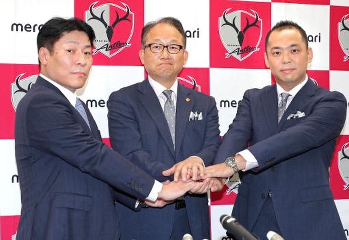 Mercari acquires management control of Kajima. Mercari and Nippon Steel Corporation agree to transfer management rights to Kashima. Making a press announcement are  from left  Hiroshi Tsuka, Executive Officer of Nippon Steel Corporation  Hiroshi Shono, President of Kashima Antlers  and Fumiaki Koizumi, President of Mericali. At the JFA House, Tokyo  photo taken July 30, 2019. 