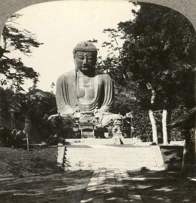  Colossal statue of Buddha, reverenced by the Japanese, in a sylvan Temple, Kamakura, Japan , c1900. Creator: Unknown.  Colossal statue of Buddha, reverenced by the Japanese, in a sylvan Temple, Kamakura, Japan , c1900. The Daibutsu, a great bronze statue of Buddha, is 13.5 metres high and weighs 93 tons, and is believed to date from the mid 13th century. Stereocard by Realistic Travels Publishers.