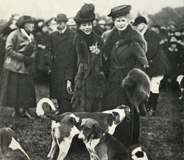  Queen Mary and Queen Alexandra at a meeting of the West Norfolk Hunt in 1920 ,  1951 . Creator: Unknown.  Queen Mary and Queen Alexandra at a meeting of the West Norfolk Hunt in 1920 ,  1951 . Queen Alexandra  1844 1925  and Mary of Teck  1867 1953  at a hunt meeting. A foxhound is sniffing Mary s fur muff. King George V is in the background. From The Queen Mother, by Marion Crawford  Crawfie , governess of Princess Margaret and Princess Elizabeth  the future Queen Elizabeth II .  George Newnes Limited, London, 1951 
