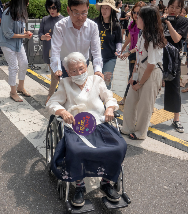 The 1,400th Wednesday Rally against Japan s wartime sex slavery in Seoul The 1,400th Wednesday Rally against Japan s wartime sex slavery, August 14, 2019 : Kim Gyung Ae  front, 91 , who said that she was forced to become a comfort woman or sex slave by Japanese military during the Second World War, leaves after attending the 1,400th weekly protest against Japanese government to demand official apology from Tokyo, in front of the Japanese Embassy in Seoul, South Korea. August 14 is International Memorial Day for Comfort Women, which is the date the late Kim Hak Sun, a former comfort woman, first publicly testified in 1991 about Japan operating an organized military brothel program during World War II. According to local media, historians say up to 200,000 women, mostly Koreans, were coerced into sexual servitude in front line Japanese brothels during World War II when the Korean Peninsula was a Japanese colony.  Photo by Lee Jae Won AFLO   SOUTH KOREA 
