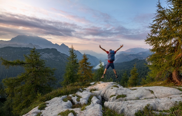 Germany Hiking Hiker jumps, summit of Feldkogel, view of K nigssee at sunset, left Watzmann S dspitze and Watzmannkinder, Berchtesgaden National Park, Berchtesgadener Land, Upper Bavaria, Bavaria, Germany, Europe, Photo by Mara Brandl